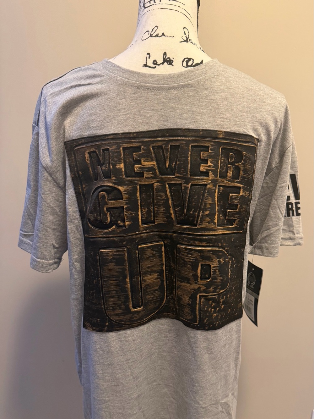 Never Give Up Embossed Graphic Tee - Picture 3 of 7